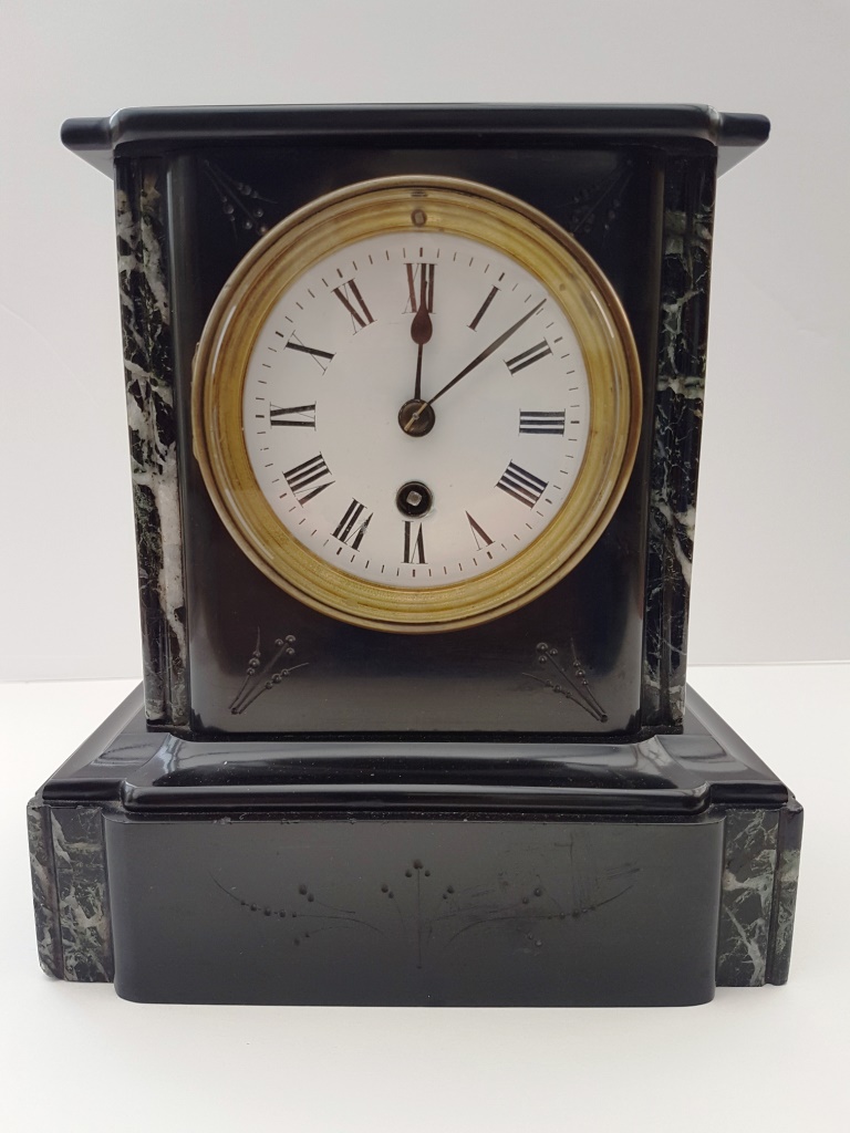small marble pillared black slate mantel clock
