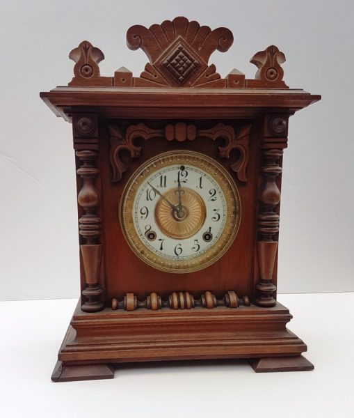 Ornate striking Ansonia mantel clock